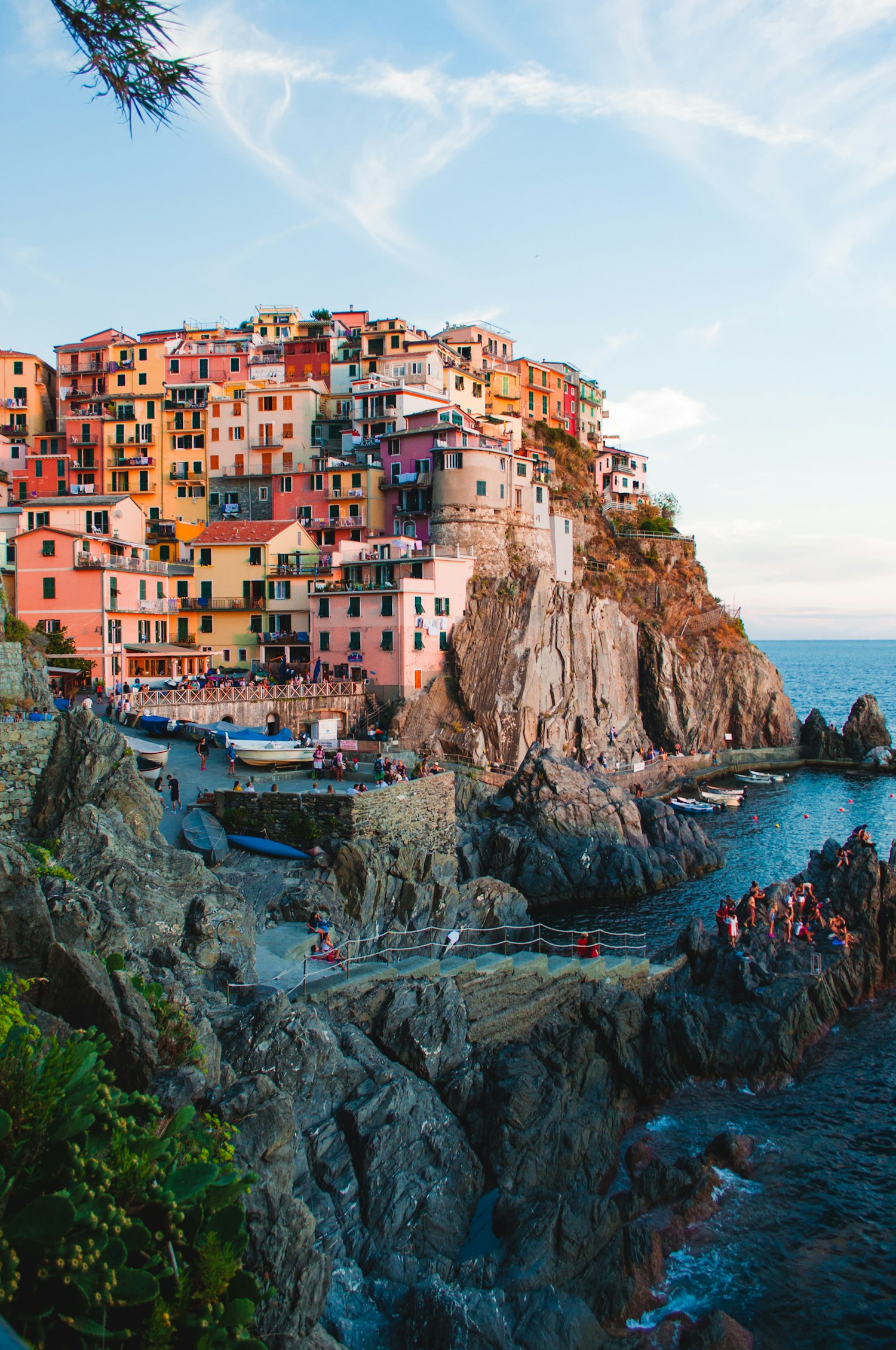 Colourful coastal buildings above the water